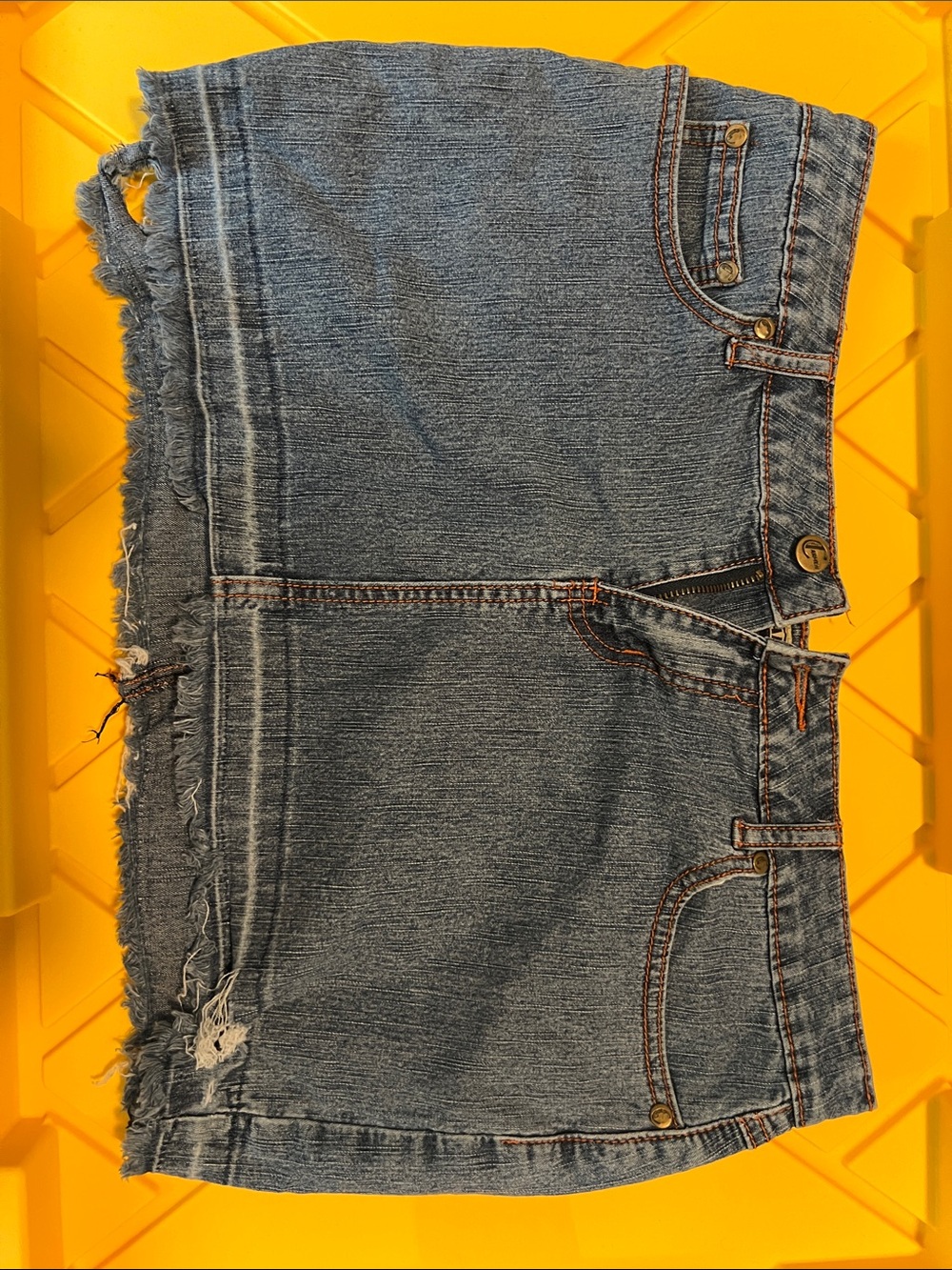 Distressed Blue Denim Mini Skirt with Frayed Hem